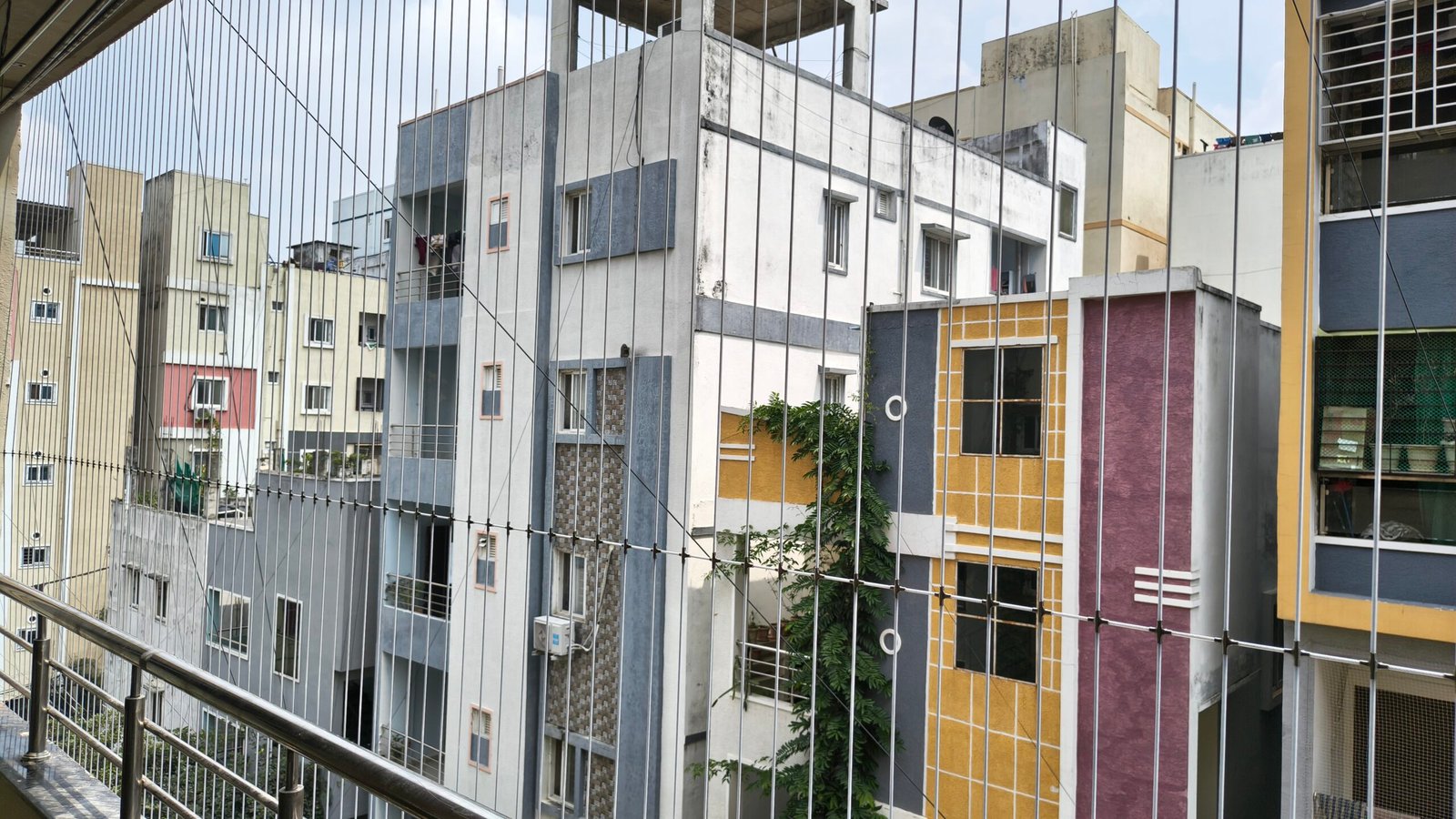 Invisible grills installation for a Chennai balcony